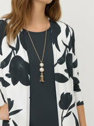 Open-front three-piece co-ord set with longline cardigan, round-neck tank, and wide-leg trousers in lightweight knit fabric