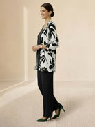 Open-front three-piece co-ord with longline cardigan, tank top, and wide-leg trousers in lightweight knit fabric