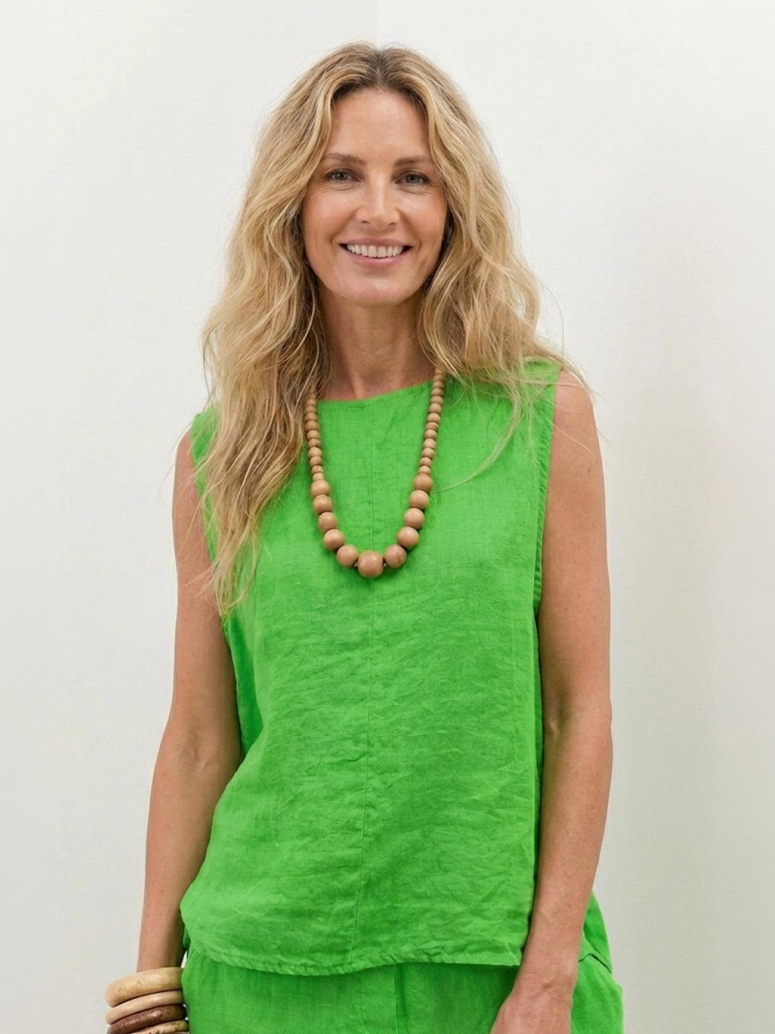 Two-piece 100% cotton crinkle sleeveless top and straight-leg pants set in lightweight breathable fabric