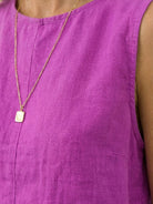 Lightweight 100% cotton crinkle sleeveless co-ord with relaxed top and straight-leg pants for warm weather.