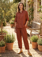 100% cotton artisan two-piece set with oversized button-front shirt and wide-leg cropped pants in natural crinkle texture