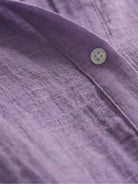 Lightweight 100% cotton popover blouse with relaxed fit and crinkled texture