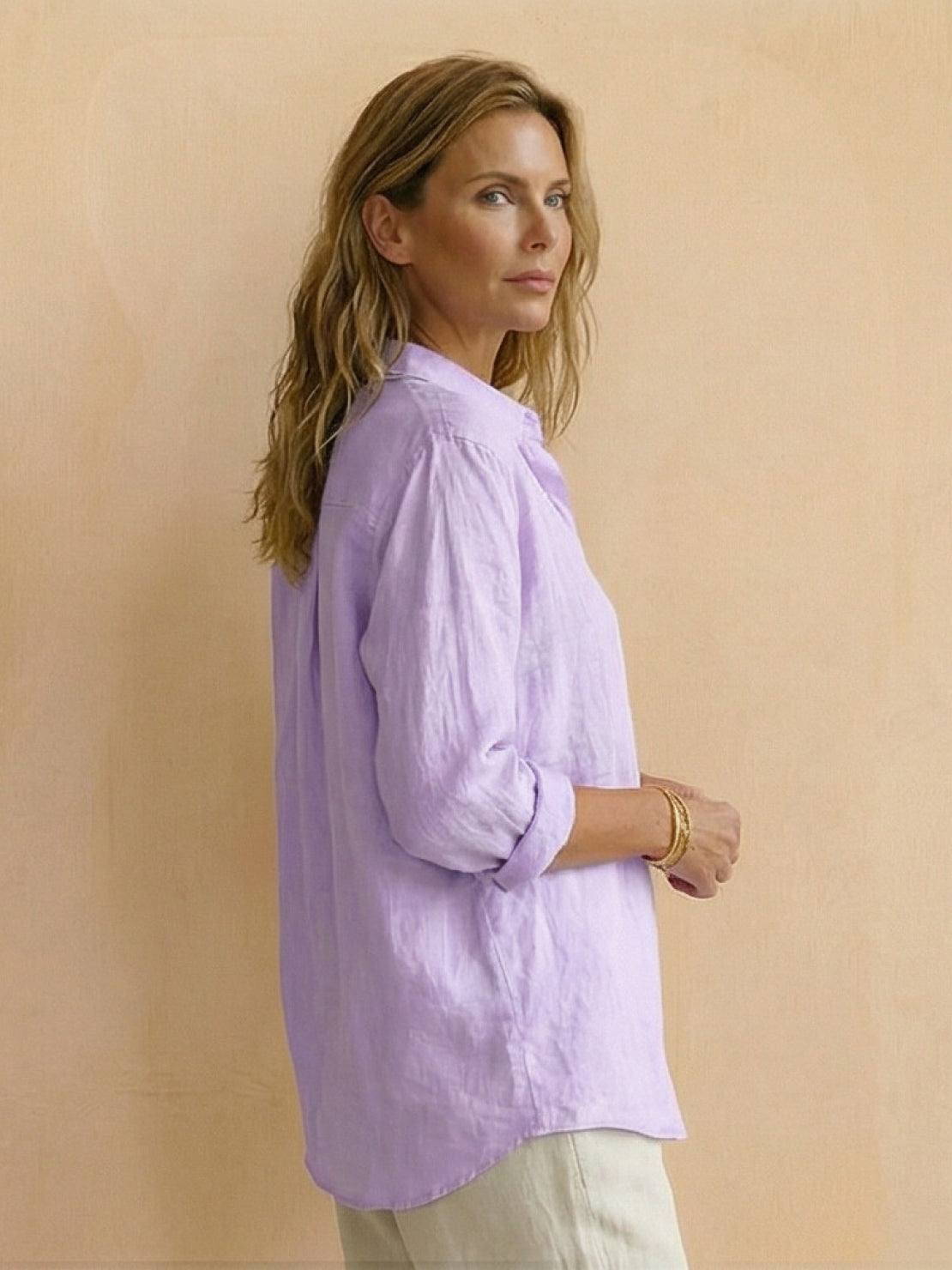 Lightweight 100% cotton popover blouse with relaxed fit, classic collar, and curved hem.