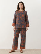 100% cotton Chinese Pankou pajamas set with tunic top and wide-leg pants featuring frog closures and contrast piping