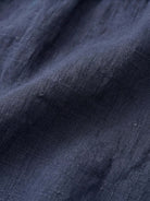 100% linen relaxed midi dress with short sleeves and front patch pockets