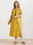 100% linen relaxed midi dress with short sleeves and large front pockets