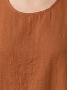 Lightweight cotton linen sleeveless maxi dress with round neckline and flowing ankle-length silhouette