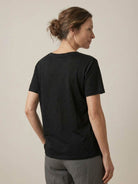 Linen-Bamboo V-Neck Tee with deep V-neck, short sleeves, relaxed fit, and smooth breathable fabric blend of linen and bamboo viscose.