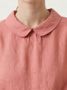 100% linen two-way button blouse with A-line silhouette, cap sleeves, and Peter Pan collar