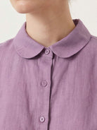 White 100% linen two-way button blouse with cap sleeves and Peter Pan collar