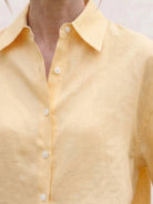 White 100% linen dropped-shoulder shirt with oversized fit and side slits