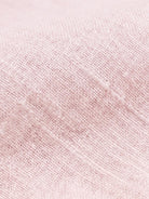 100% linen dropped-shoulder oversized shirt with side slits and rollable cuffs