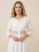 Rusty orange cotton linen dress with embroidered smocked waist and asymmetric midi skirt