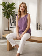 Lightweight sleeveless cotton linen top with chest pocket and curved hem