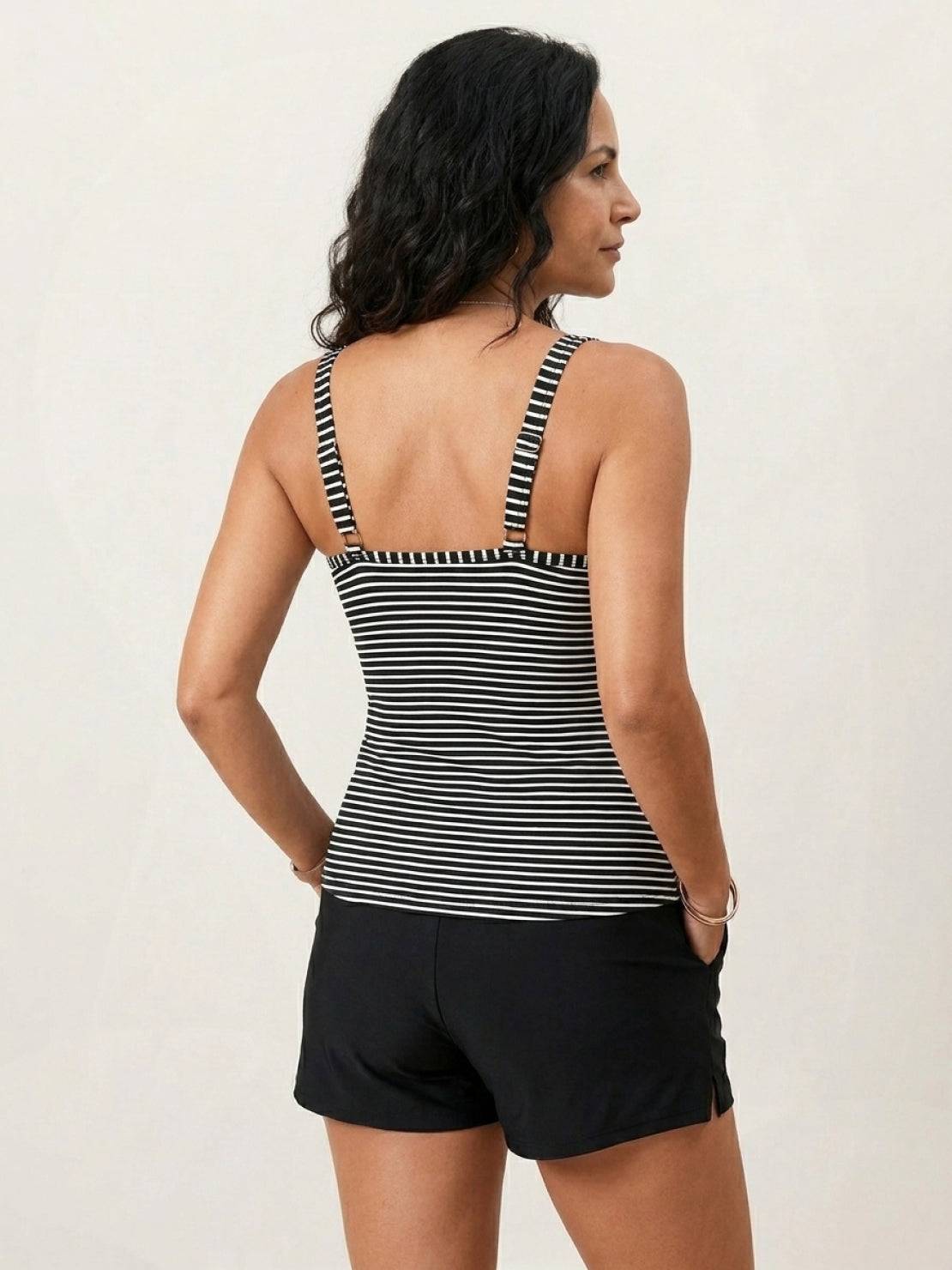 Classic V-notch tankini set with ruched top and high-waist swim shorts.