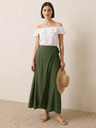 asymmetrical wrap maxi skirt with side tie closure and flowing hem in multiple colors