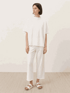 Cotton-blend capelet lounge set with mock neck cape-style top and wide-leg pants in multiple colors