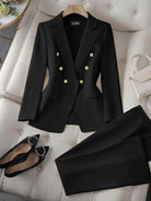 Double-breasted blazer with gold lion-head buttons and wide-leg trousers co-ord set in structured suiting fabric