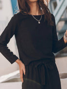 woman wearing cotton-linen monochrome relaxed longline top and wide-leg pants set