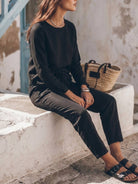 Woman wearing a relaxed cotton-linen monochrome longline top and wide-leg pants set