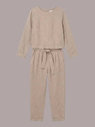 Woman wearing relaxed cotton-linen monochrome longline top and wide-leg pants set