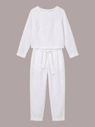 Woman wearing relaxed cotton-linen monochrome longline top and wide-leg pants set