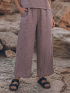 woman wearing soft-tailored loose fit co-ord set with wide-leg trousers in light fabric