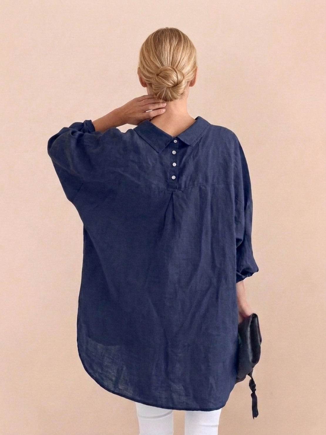 Oversized linen shirt in breathable cotton-linen blend with relaxed fit and button back detailing