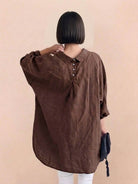 Oversized linen shirt in soft breathable cotton blend with relaxed fit and button back detail