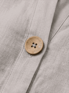 woman wearing pure linen age-defying button detail shirt in soft white