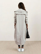 Plus size sleek minimalist hooded coat for travel, lightweight and oversized fit.