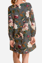 Back view of all over floral print linen shift dress with long sleeves and relaxed fit