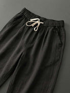 Woman wearing breezy relaxed fit straight pants in casual stylish setting