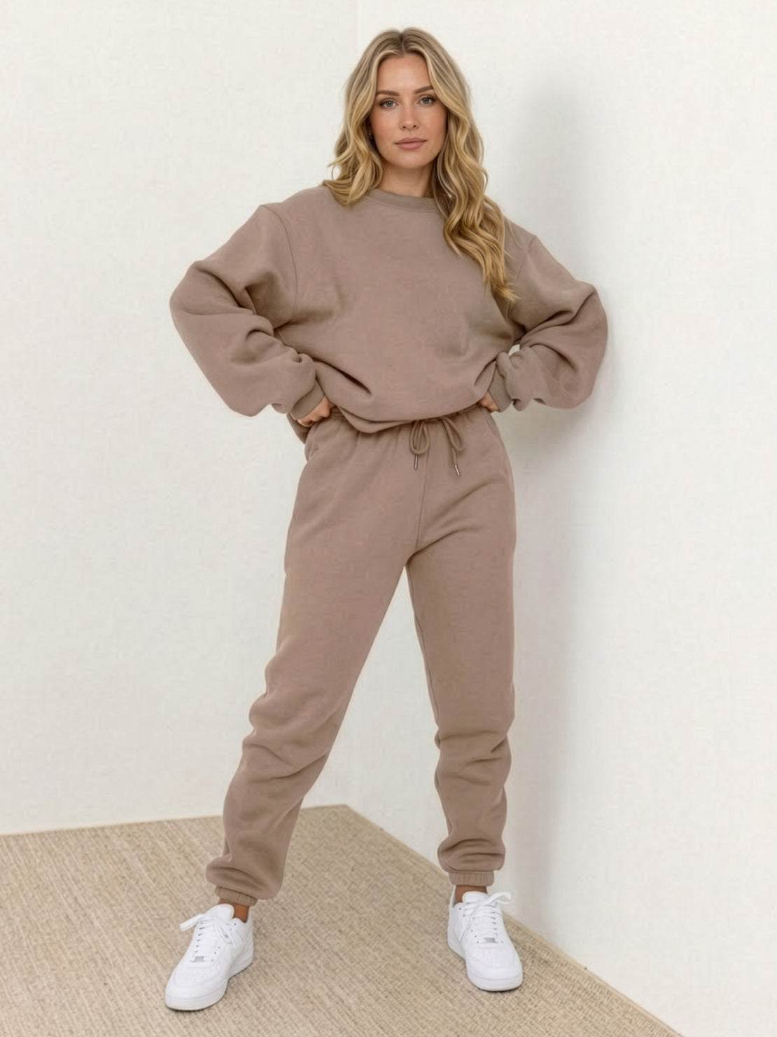 Woman wearing Classic Comfort Athleisure set, showcasing stretchy, flattering activewear in casual setting