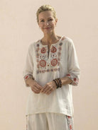 Coastal Comfort Linen two-piece set with artisan crochet and breathable fabric