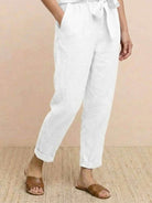 Cotton linen monochrome straight-leg pants with drawstring waist and breathable fabric texture