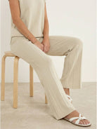 First Class Travel two-piece set with breathable viscose-acrylic blend and pleated wide-leg pants for elegant, wrinkle-resistant comfort