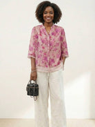 French boutique style organza blouse with elegant floral print and lightweight fabric