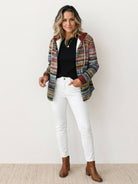 Highland Plaid Shacket with fleece lining, hood, button front, and plaid pattern for cool weather layering