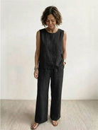 Loose solid color sleeveless two-piece set with oversized fit and breathable cotton blend fabric