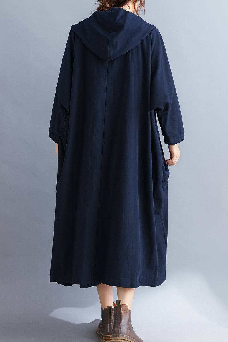 Oversized navy water resistant windbreaker jacket with hood and longline design for all-season wear