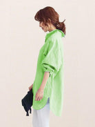 Oversized linen shirt in breathable cotton-linen blend with relaxed fit and back button detail