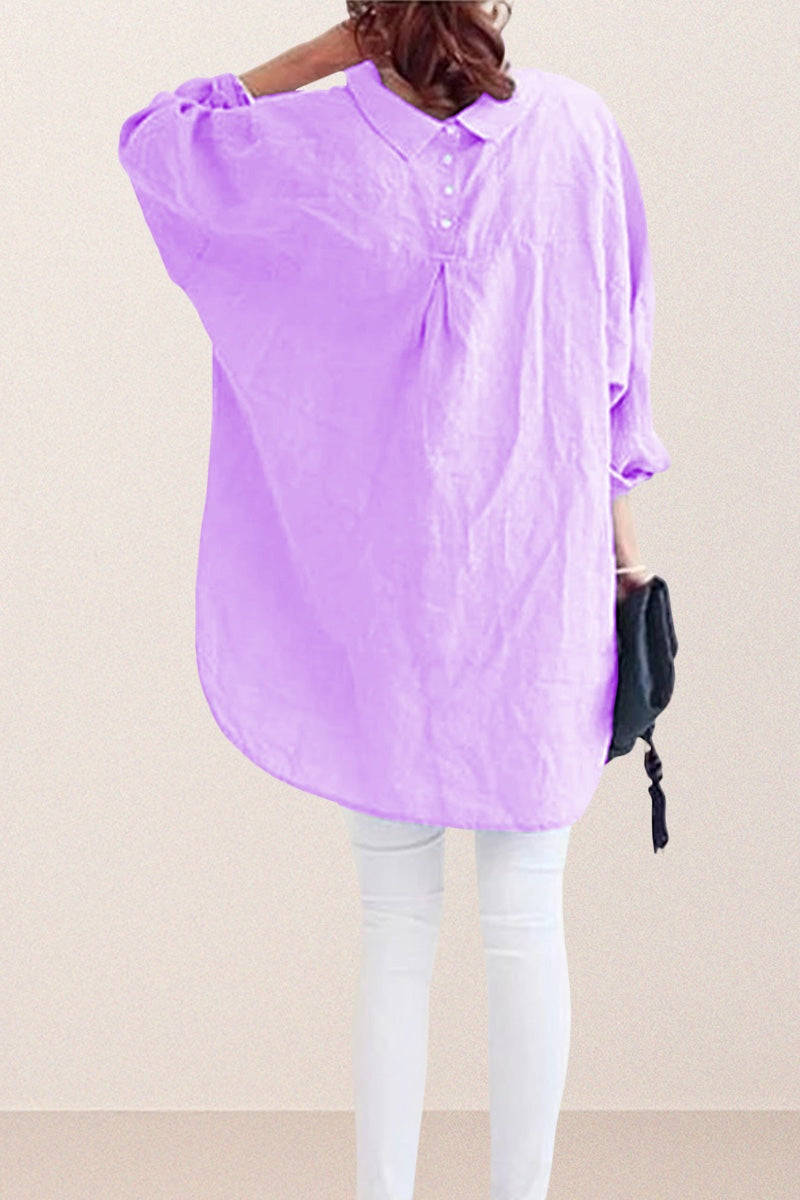Back view of oversized linen shirt in soft purple with relaxed fit and gathered yoke detailing