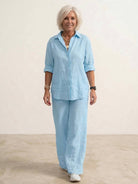 Woman wearing oversized 100% cotton shirt with wide-leg pants co-ord set in relaxed style