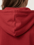 Women wearing oversized long zip sweatshirt hoodie with fleece lining and front pockets