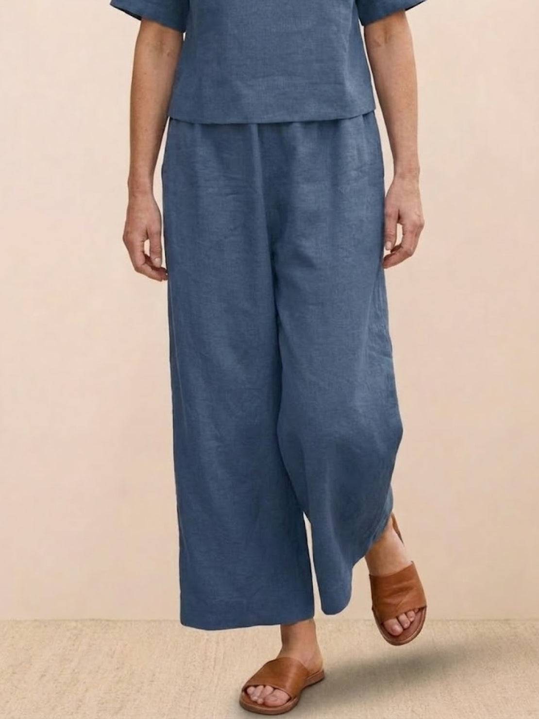 Loose fit co-ord set with relaxed top and wide-leg bottoms in breathable blue fabric.