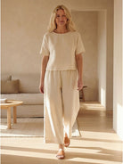 Loose fit co-ord set with soft-tailored top and wide-leg bottoms in breathable cotton blend fabric