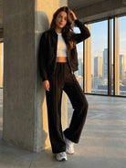 The Voyager Zip Set two-piece zip-front sweatshirt and wide-leg joggers in light polyester blend for travel and casual style