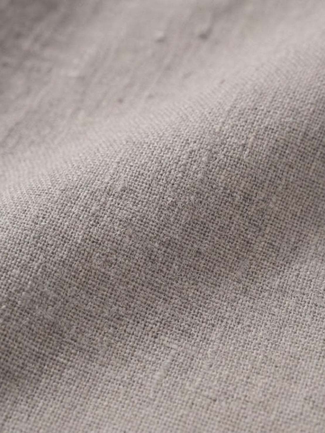 Close-up of soft, lightweight cotton fabric texture for breathable cotton dress