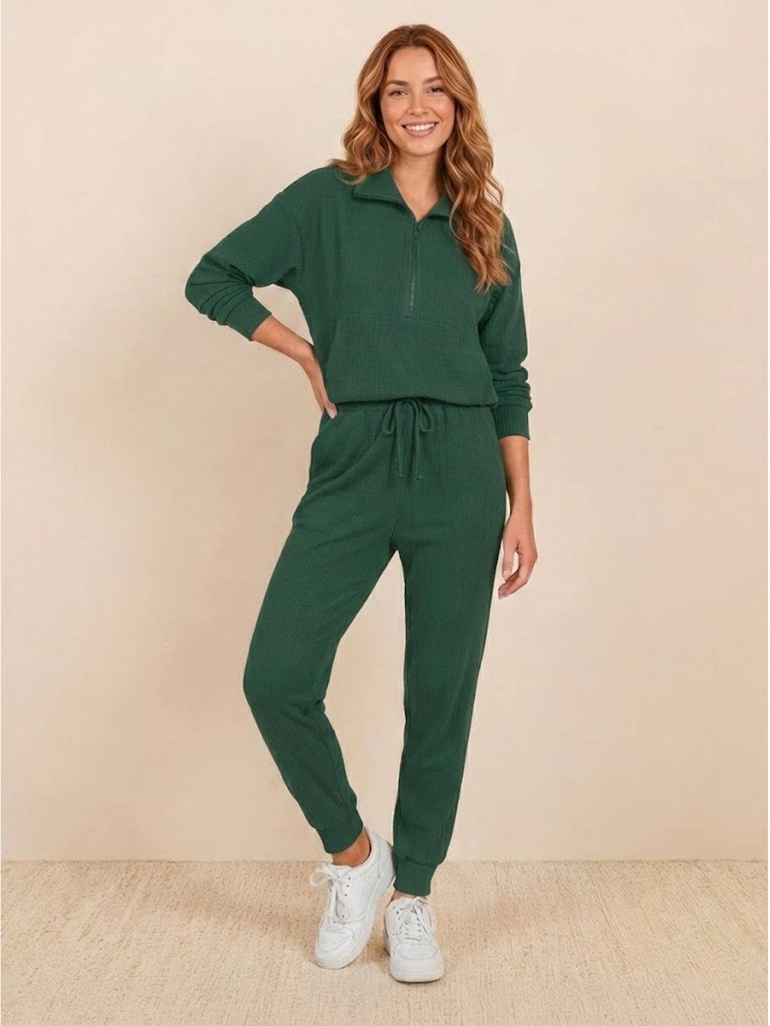 Unisex half-zip pullover and sweatpants set in relaxed fit with soft fabric for casual comfort and travel